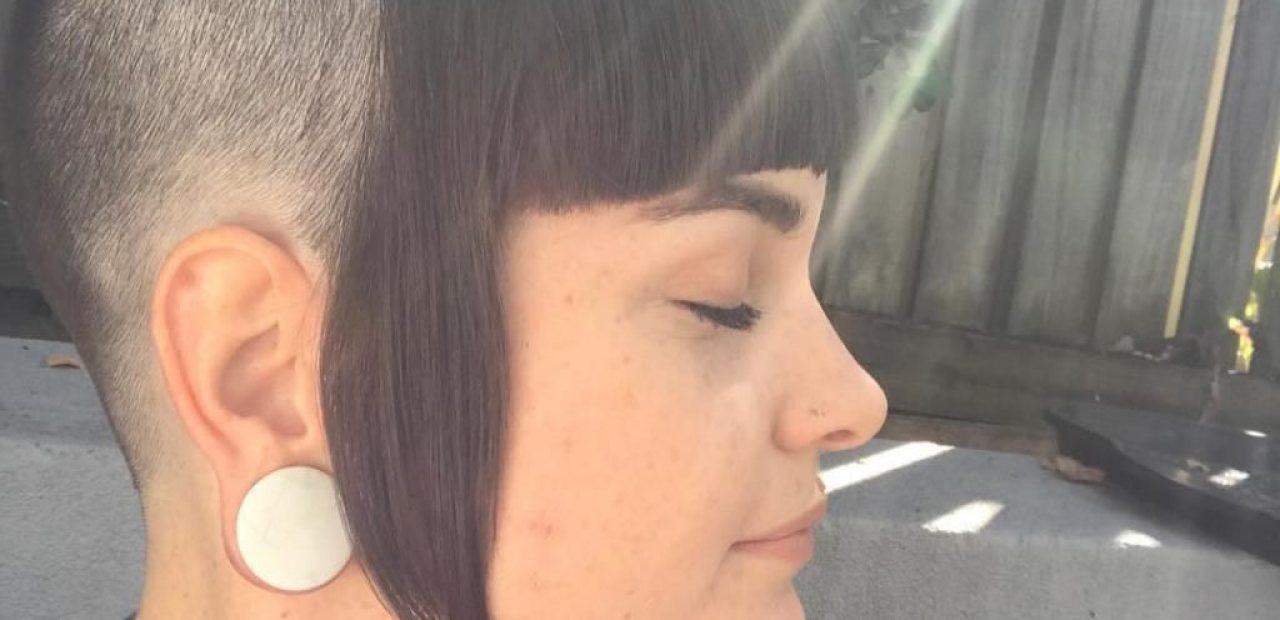 Female head shaving fetish